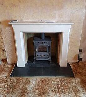 Limestone surround fitted and new hearth. Just waiting for the decorator to come!